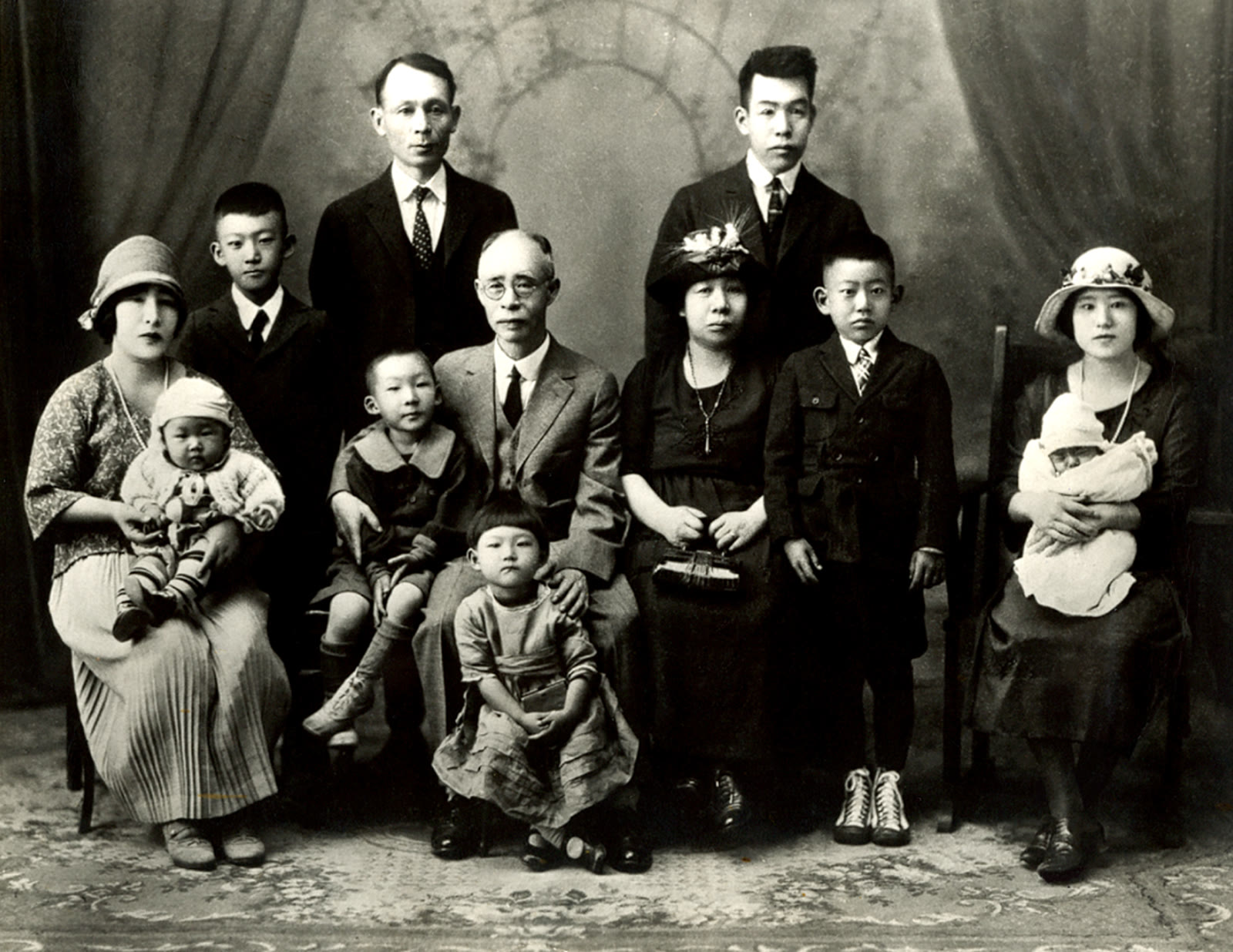Family portrait — Shinkichi as a baby, left, on his mother's lap, 1924